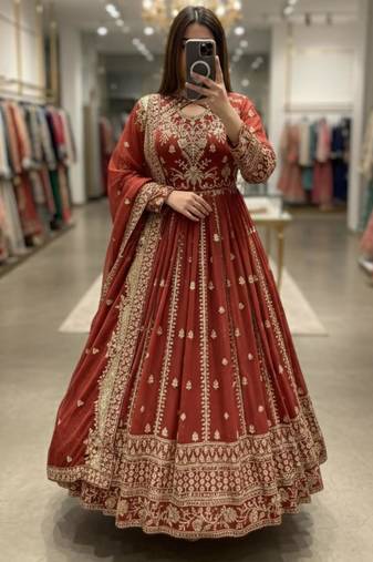 Red faux georgette embroidered flared gown set