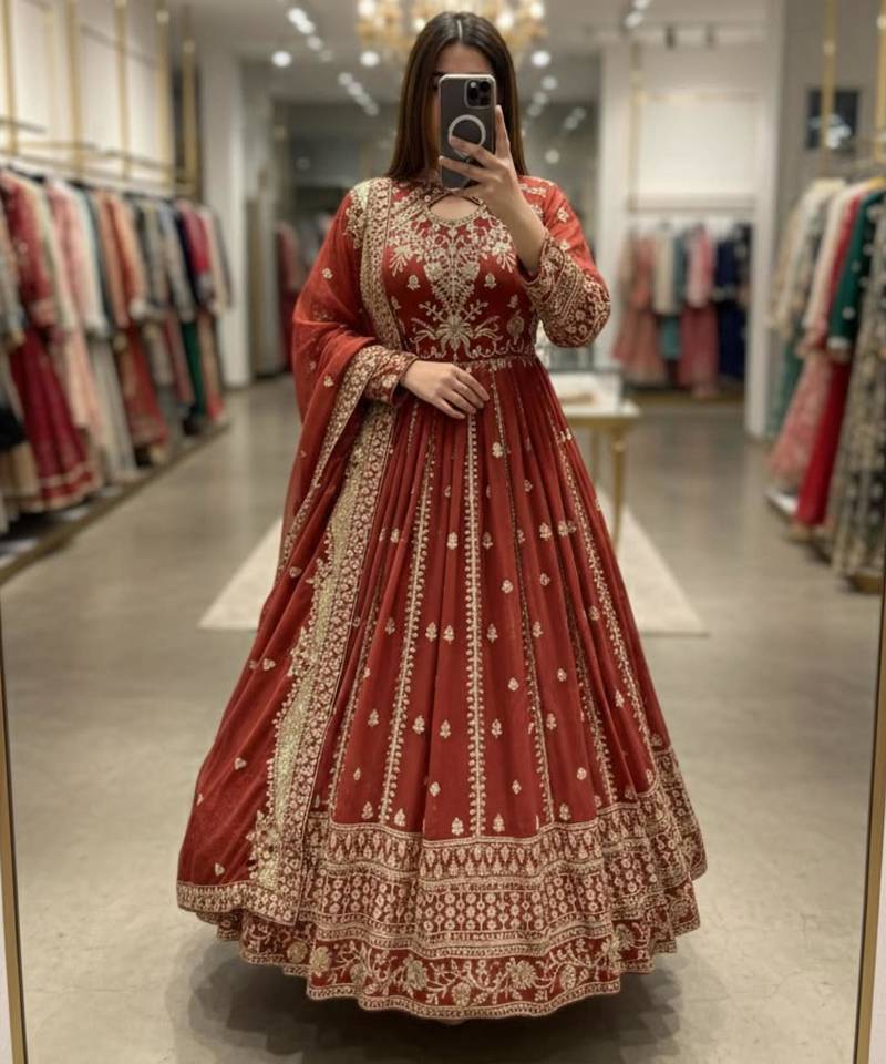 Red faux georgette embroidered flared gown set