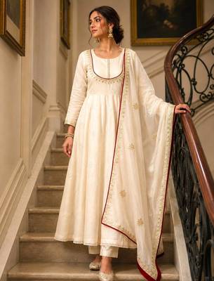 Cream cotton silk embroidered flared gown set 1