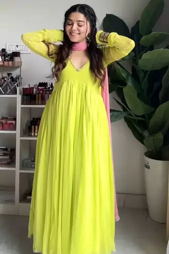 Green faux georgette embroidered flared gown set