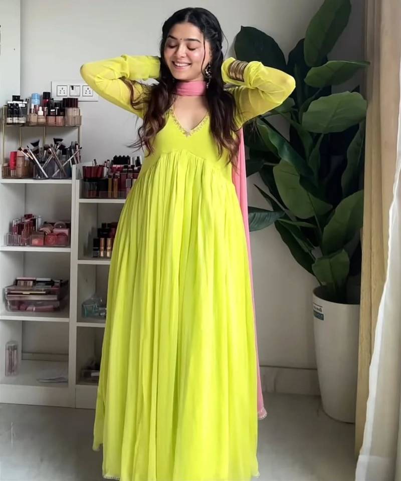 Green faux georgette embroidered flared gown set