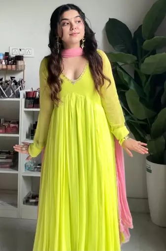 Green faux georgette embroidered flared gown set