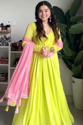 Green faux georgette embroidered flared gown set