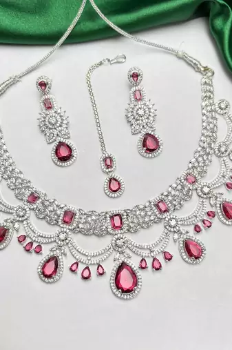 ruby red bridal jewellery set, silver-plated choker, drop earrings, maang tikka, bollywood statement necklace