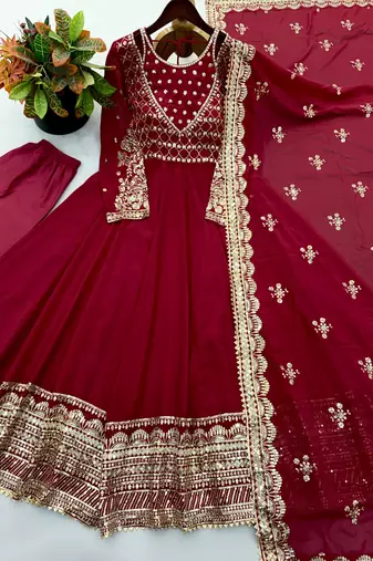 Red faux georgette embroidered flared gown set