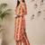 Women Printed Cotton Kurta with Trousers