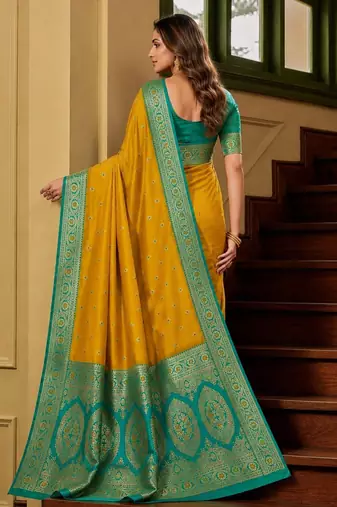 Yellow soft banarasi silk saree with zari weaving meenakari design