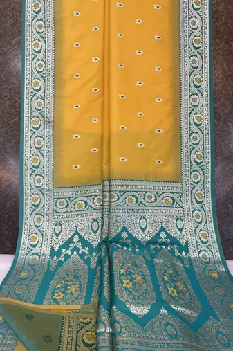 Yellow soft banarasi silk saree with zari weaving meenakari design