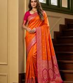 Orange soft banarasi silk saree with zari weaving meenakari design