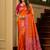 Orange soft banarasi silk saree with zari weaving meenakari design