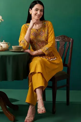 Women Ethnic Motifs Embroidered Thread Work Kurta with Trousers