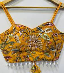 Yellow designer embroidery and sequence work spaghetti strap blouse