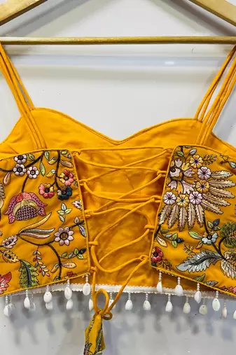 Yellow designer embroidery and sequence work spaghetti strap blouse