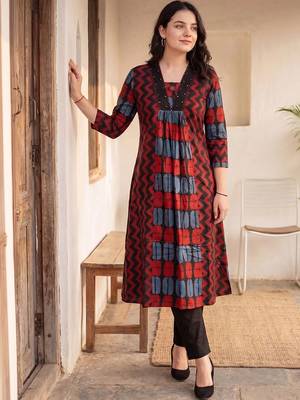 Women Ethnic Motifs Printed Cotton Kurta with Trousers 4
