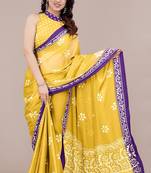 yellow batik printed chiffon saree with unstitched blouse piece