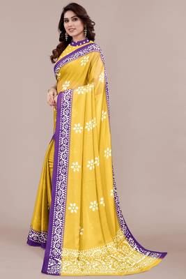 yellow batik printed chiffon saree with unstitched blouse piece 4