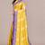 yellow batik printed chiffon saree with unstitched blouse piece