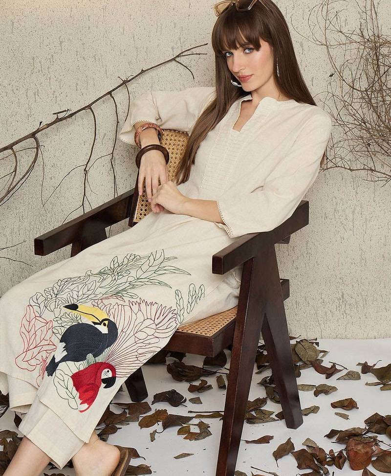 Women Ethnic Motifs Embroidered Cotton Kurta with Palazzo