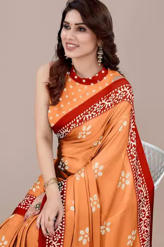 orange batik printed chiffon saree with unstitched blouse piece