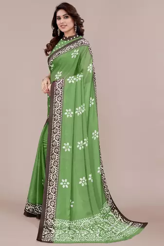 green batik printed chiffon saree with unstitched blouse piece