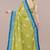 green batik printed chiffon saree with unstitched blouse piece