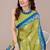 green batik printed chiffon saree with unstitched blouse piece