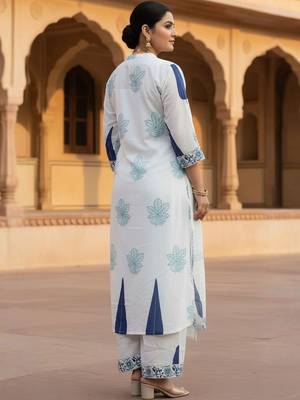 Women Printed Thread Work Cotton Kurta with Trousers & Dupatta 4