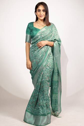 green floral printed cotton silk saree with unstitched blouse piece