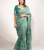 green floral printed cotton silk saree with unstitched blouse piece