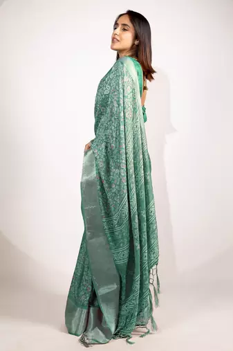 green floral printed cotton silk saree with unstitched blouse piece