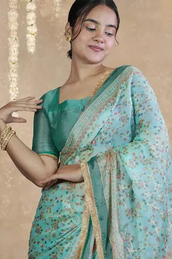 teal floral printed chiffon saree with unstitched blouse piece