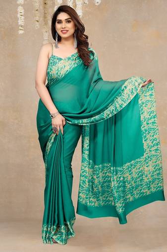 teal green abstrect print chiffon saree with unstitched blouse piece