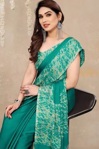 teal green abstrect print chiffon saree with unstitched blouse piece