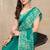 teal green abstrect print chiffon saree with unstitched blouse piece
