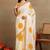 off white block print chiffon saree with unstitched blouse piece