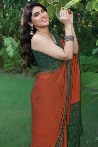 rust floral printed chiffon saree with unstitched blouse piece