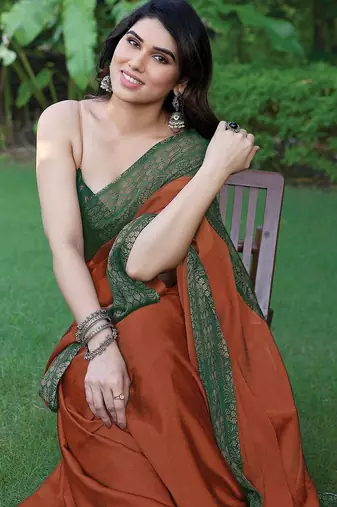 rust floral printed chiffon saree with unstitched blouse piece