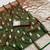 Green soft silk blend saree with zari weaving meenakari design
