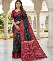 Black art silk ikkat and patola weaving concept saree & contrast blouse
