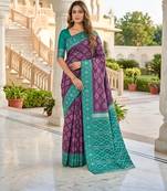 Wine art silk ikkat and patola weaving concept saree & contrast blouse