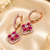 Rose gold finish sparkling bloom hoop earrings