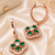 Rose gold finish luxe floral hoop earrings