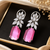 Rhodium finish celeste crystal drop earrings