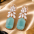 Rose gold finish flora luxe statement earrings
