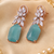 Rose gold finish flora luxe statement earrings