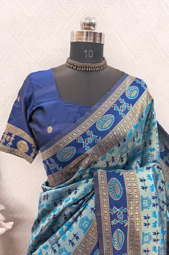 TURQUOISE ART SILK BANARASI JACUARD WORK SAREE WITH UNSTITCHED BLOUSE PIECE