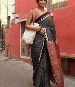 black japan satin silk blend ajrakh print saree with contrast blouse