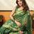 green cotton blend feel saree with elegant jhallar border