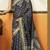 navy blue cotton blend feel saree with elegant jhallar border