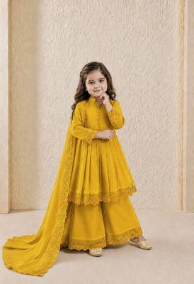 Heavy roman silk embroidery  work and yellow readymade salwar suit 1